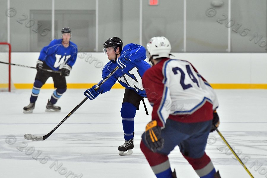 Wheaton College Men\'s Ice Hockey vs Middlesex Community College. - Photo By: KEITH NORDSTROM